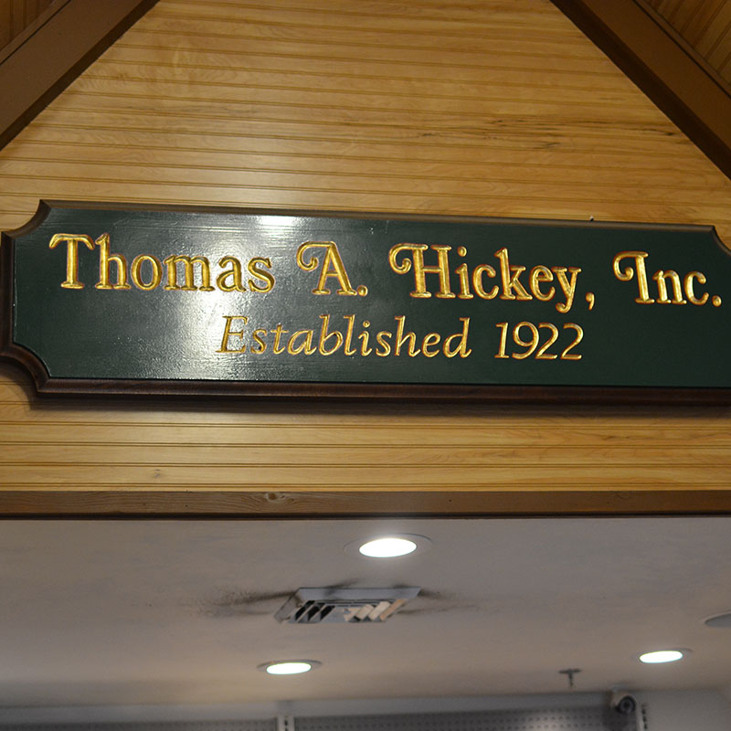 Hickey’s Wine & Spirits establishment signage that reads "Thomas A. Hickey, Inc. Established 1922."