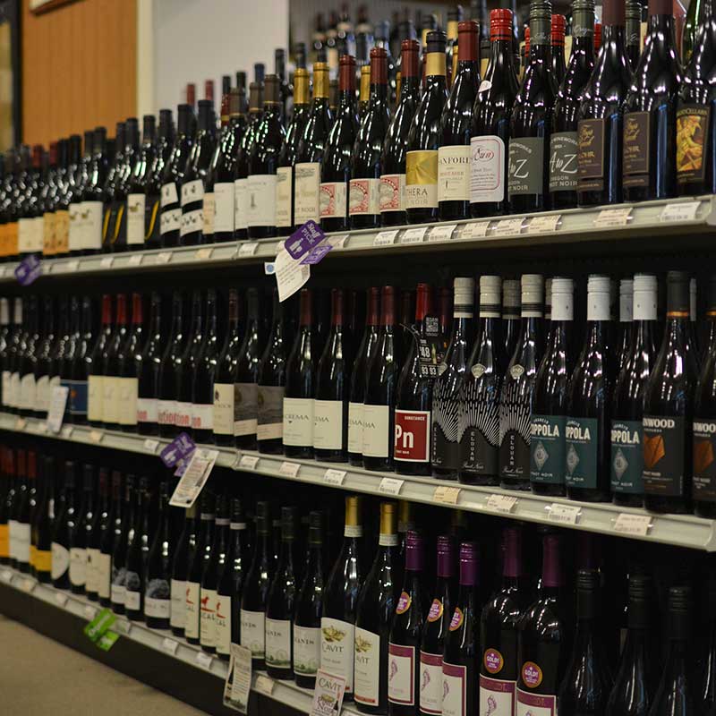 A selection of wine on shelves at Hickey's Wine & Spirits.